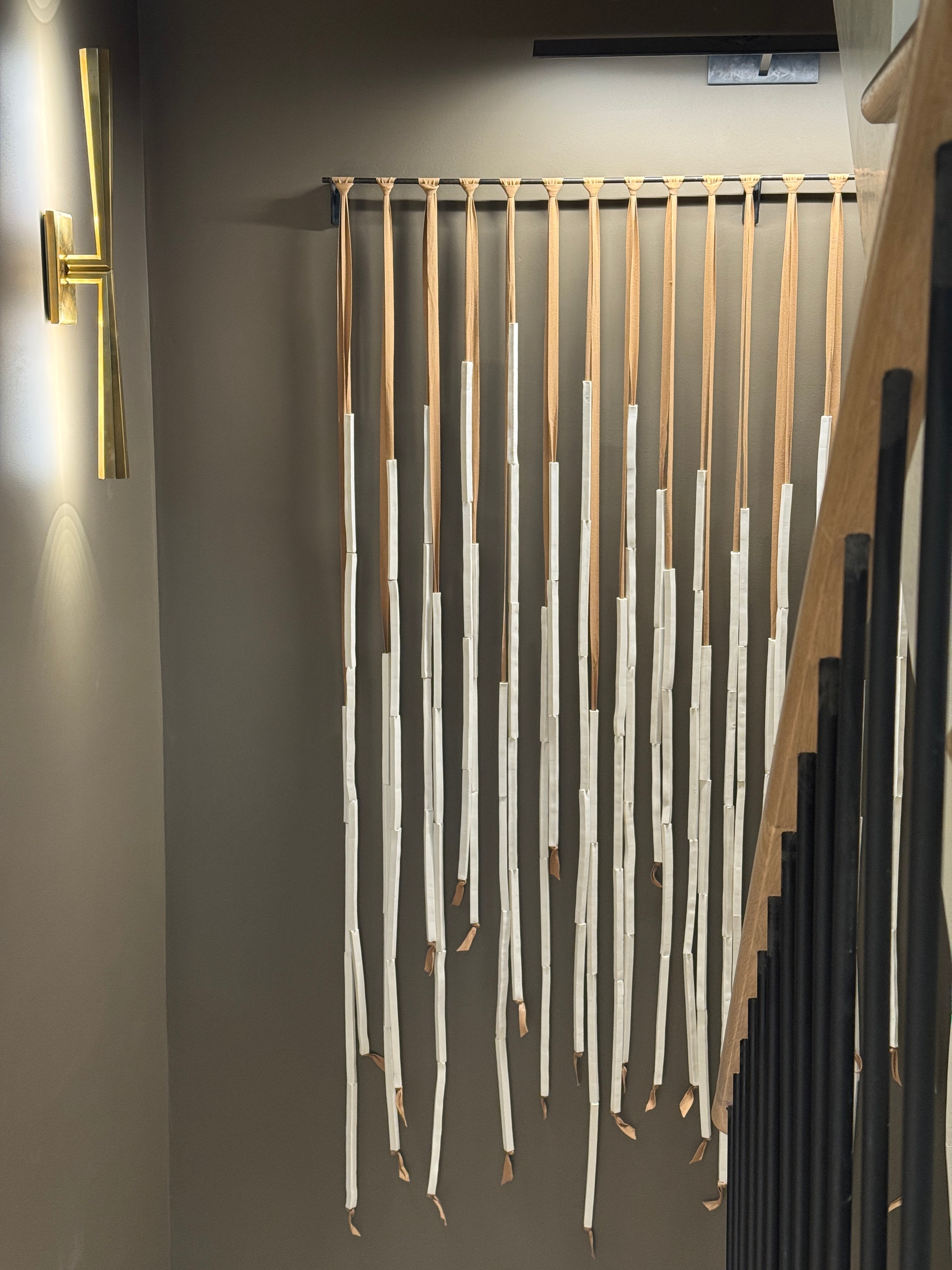 Vertical ceramic strand sculpture detail with light and shadow – Cobblestone Residence installation by Lauren HB Studio